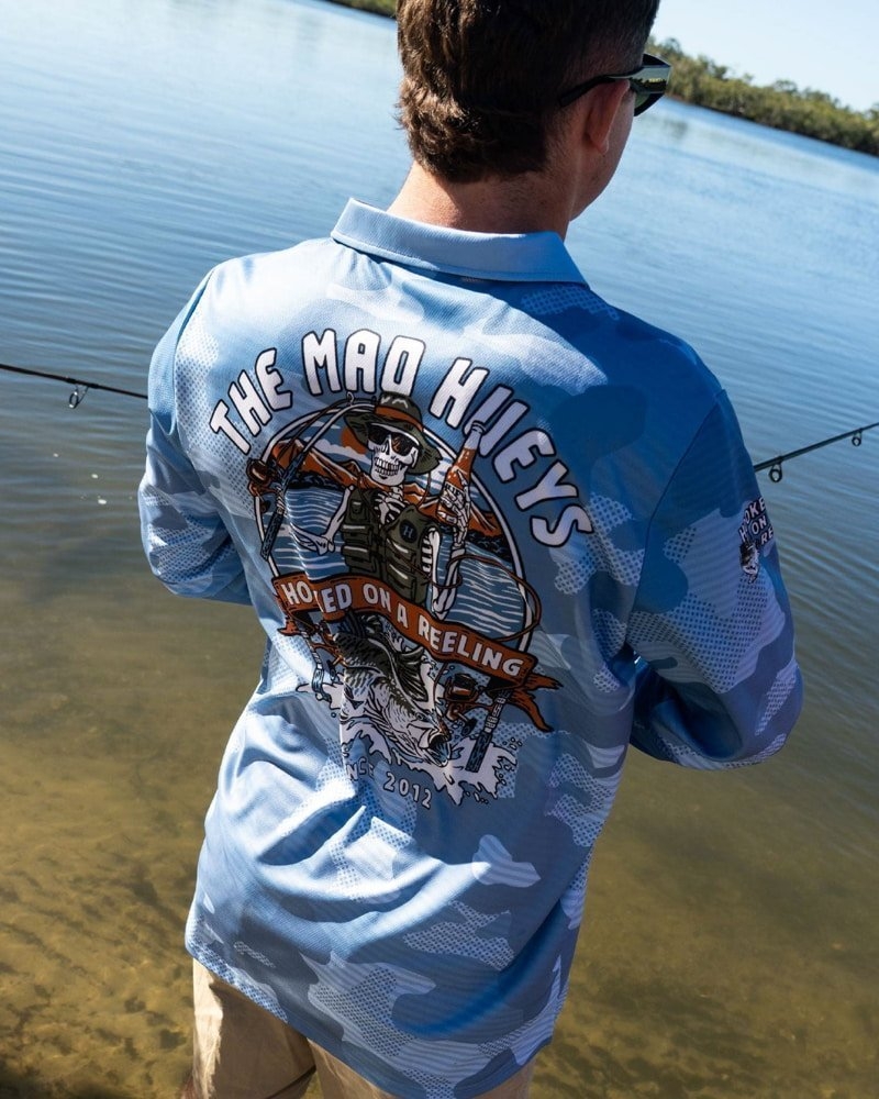 The Mad Hueys Hooked On A Reeling UPF50+ Fishing Jersey Steel Blue